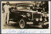 Julio Iglasias presented Alfred DiMora with an autographed photo of Julio next to his Clenet Series II.