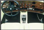 The 1987 Series II has standard features such as power seats, power windows, lambs wool carpeting, and cruise control that were extras on most other cars.
