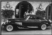 This Series II Cabriolet, unique for its outside spare tire and lack of external sun visors, appears in a Clenet brochure.