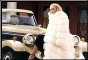 A proud Clenet owner shows off her new Series II Cabriolet.