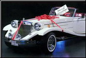 In 1986, the cards used to send Christmas wishes to friends and associates of Clenet Coachworks featured a Clenet Series III Asha.